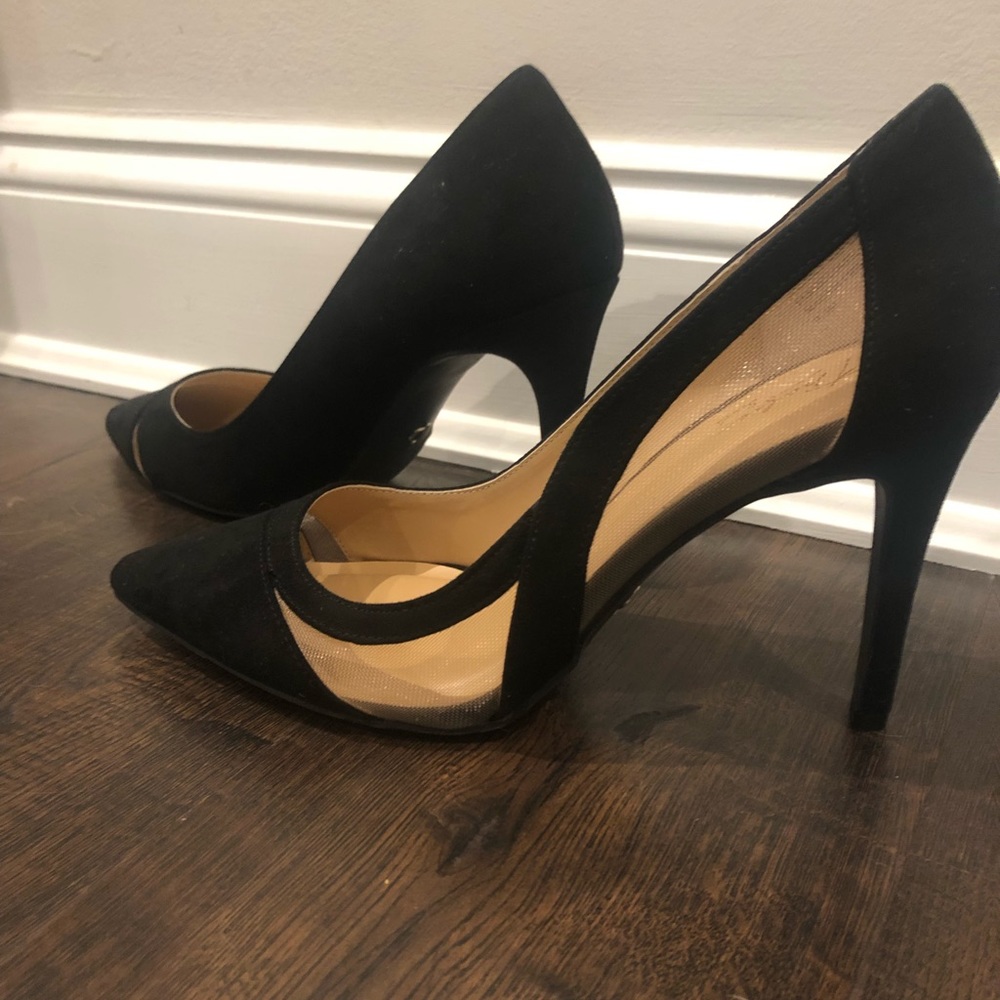 Black velvet pointed toe heels with peekaboo cutouts with nude netting.